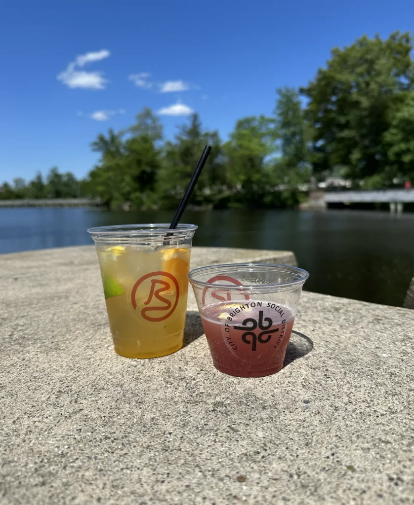 two cocktails from bourbons in downtown brighton michigan social distrct on a sunny summer day